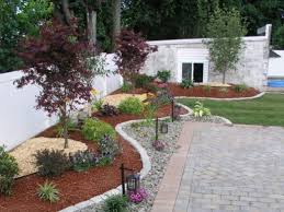 In this example, the tiered landscaping mimics the design of the house behind it. 16 Really Amazing Landscape Ideas To Beautify Your Front Yard