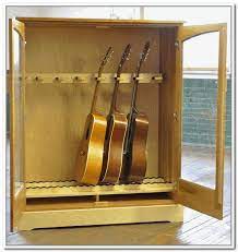 Proper storage is the best way to prolong the life of any wood instrument. Guitar Storage Cabinet Plans Guitar Storage Guitar Storage Cabinet Guitar Display