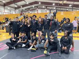 Heavy hitters: Foster sends 14 to regionals; Nwankwo named outstanding  wrestler