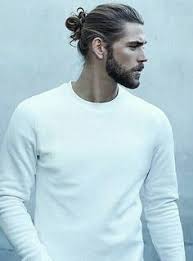 Hair Pulled Back Into Top Knot Ponytail Men S Hairstyle Cool Hairstyles For Men Mens Hairstyles Thick Hair Long Hair Styles Men
