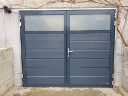 Landhausstil garagentore holzoptik garage rustikal haus stile. Flugeltore Individuell Designen Lassen Torbau Sissach