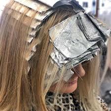 We know how tempting it is to browse the hair color aisle whenever you're in the drugstore, fantasizing about what life might look like with red or blonde hair. How Long Do You Leave Foils In Your Hair According To A Professional Hair Stylist