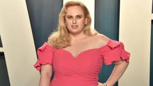 Wilson let fans know she was surfing for the first time. Rebel Wilson Turns Heads In Hot Pink Swimsuit After Incredible Weight Loss Iheartradio