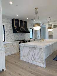 Bjarke ingels group, cecilie manz or norm architects. White Kitchen With Marble Island White Marble Kitchen Marble Island White Interior Design