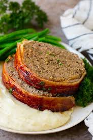 Bake the meatloaf at 350 degrees fahrenheit for around an hour or until the temperature of the loaf's center is approximately 160 f when tested with a meat thermometer. Bacon Wrapped Meatloaf Dinner At The Zoo