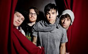 Patrick stump.all the other guys sing too while using instruments or something,but i'd say patrick stump is the lead singer of the band. Fall Out Boy Reunite With New Album Save Rock And Roll