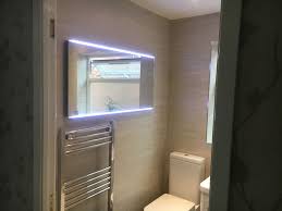 Bathroom walls looking a little tired? Beige Tile Bathroom Sps Plumbing Services