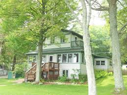 Craftsman Cottage On Hamlin Lake Ludington Mi Water Is 3 Feet Deep At Sea Wall Pets Ok Vacation Cottage Lake Vacation Craftsman Cottage