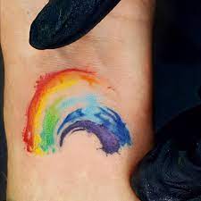 In celtic tradition, rainbows have pots of gold at the end of them. The Greater Your Storm The Brighter Your Rainbow Rainbow Tattoos Baby Tattoos Rainbow Tattoos Pride