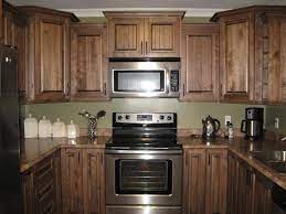 Distinctive Interiors Birch Cabinets In A Danish Walnut Stain Birch Kitchen Cabinets Kitchen Cabinets Modern Walnut Kitchen