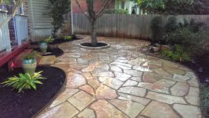 You can't beat stone as a building material for a backyard terrace. Backyard Landscape Flagstone Patio Tree Ring And Vase Fountain Patio Garden Design Backyard Landscaping Landscape Design