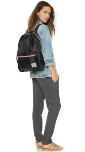 Refined with a durable, lustrous fabric and leather trims, the travel daypack is a modern utility style from the cordura collection. Herschel Supply Co Packable Daypack Backpack Black Navy Red Lyst
