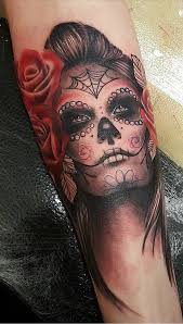 Celebrate Life And Death With These Awesome Day Of The Dead Tattoos Skull Thigh Tattoos Skull Girl Tattoo Sugar Skull Girl Tattoo
