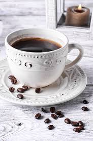 Bright Cup Of Coffee Light Set With Light Coffee On Wooden Background Coffee Drinks Coffee Cups Coffee Photos