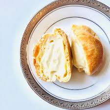 Once pastry puffs are cooled, cut small hole with paring knife in bottom of each puff. Gluten Free Cream Puffs Violeta Sweets Marketspread