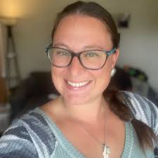 What are some water vacation rentals available in Michigan for a family of  3 and 2 dogs from 7/12-7/15?