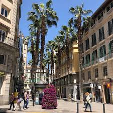 Malaga S Bustling Streets With Beautiful Balconied Buildings And Tall Palm Trees Is The Perfect Backdrop To Our Daytime Market Like A Local Malaga Spain Malaga