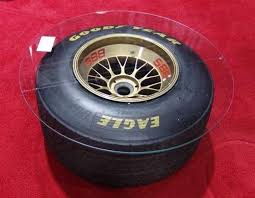 One elite formula brings together great photography to provide you with an incredible coffee table summary of the formula 1 season. Collectible Coffee Tables Scuderia Ferrari Bbs Wheel Table Is Perfect For Racing Fans