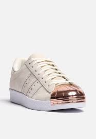 With all the signature attributes including off white suede uppers, 3 stripe branding, rubber outsole and rose gold metallic shell toe. Look What I Found On Superbalist Com Sneakers Statement Shoe Shoes