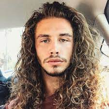 Now, tie the hair on the top of the head in a pony and let the curls fall on the sides of the head. Long Brown Curly Hair Men Novocom Top