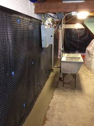 Interior Drain Tile Systems Dimple Up The Wall To Grade Affordable Egress Windows Basement Waterproofing Waterproofing Basement Basement Design Drain Tile