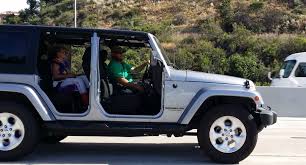 To remove the door safely, have one hand on the bottom and. Jeep With Doors Off