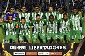 The team wears green and white vertically striped jerseys. Atletico Nacional Vs Medellin Sigue La Transmision En Vivo Online