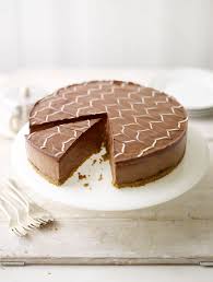 Chocolate Cheesecake With White Chocolate Icing From Home Cooking Made Easy Chocolate Desserts Cheesecake Recipes Chocolate Recipes