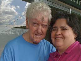 Woman charged for failure to report husband's dead body