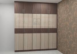 Modular 5 Door Wardrobe With The Loft Made Up Of Plywood With Laminate Finish The Color Wit Wooden Door Design Bedroom Furniture Design Wardrobe Door Designs