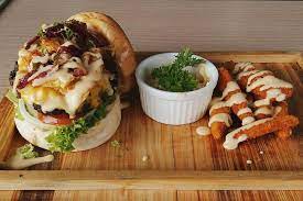 Boneless beef, cucumber, carrot and cabbage cooked in black pepper sauce. Explosive Inner Core Burger Salt Pepper Restaurant Facebook