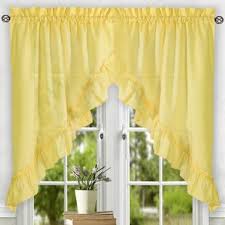 The valance provides a line of definition, emphasizing the bed and window as the room's focal point. Bedroom Valances And Swags Wayfair