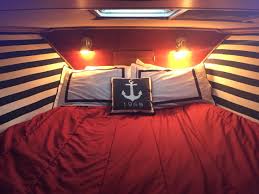 Reupholstered The V Berth And Trimmed It Out With Sisal Rope Found This Pillow We Customized With The Year Boat Interior Design Boat Decor Sailboat Interior