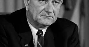 President Lyndon B. Johnson at his desk in the White House Nov. 29, 1963.  (AP photo/Henry Burroughs)