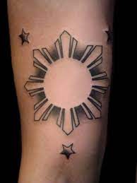 This flag is made of silk, has a five pointed star at each angle of the white triangle that presses up against the left part of the flag. Flag Of The Philippines Filipino Tattoos Sun Tattoos Tattoos
