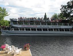 The Lady Muskoka Cruises Muskoka River Past A Pair Of Muskoka Chairs On A Dock Near Bracebridge Ontario Most Beautiful Places Beautiful Places Muskoka Chair