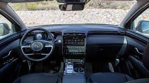 A side view of the 2022 hyundai tucson; First Drive 2022 Hyundai Tucson Electrifies Its Looks And Powertrain