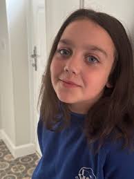 Uplands Primary School student getting hair cut for charity