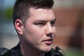 Officer saves woman who was 'carrying a big ball of fire'