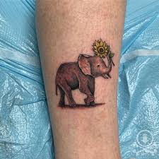 Pin By Becca On Tattoo Ideas Cute Elephant Tattoo Tattoos Sunflower Tattoo