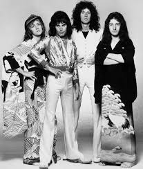 Black Bands Of The 70s Seems To Be In The 70s Either One Was Wearing Black While The Rest Wore White And Vise Versa Queen Photos Queen Pictures Queen Band