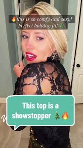 The top is so soft and can be worn lots of ways!! #tiktokmademebuyit  #holidaytiktok #lacetop #lace #holidayfashion #holidaypartyoutfit