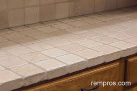 natural stone tile vs quartz kitchen