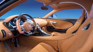 The Interior Features A C Shaped Strip Of Led Accent Lighting That Bisects The Cabin Bugatti Cars Bugatti Chiron Interior Bugatti Chiron