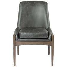 Like that the faux leather has some distressing for a more authentic look. Olena Mid Century Modern Black Leather Sculpted Nettle Wood Dining Chair Kathy Kuo Home