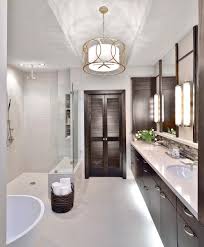 Closeup shot of a wooden floor with dark brown vertical tiles. 11 Creative Ways To Make A Small Bathroom Look Bigger Designed