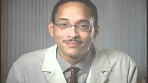 Marcus E. St. John, MD