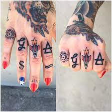 Finger Tattoos By Andrea Revenant Finger Tattoos Hand Tattoos For Guys Tattoos