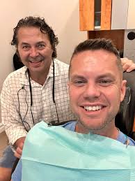 What a guy! What a dentist! Dr. Oliver came in