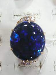 Dark blue opal rings, made of tungsten carbide with authentic opal inlay. Dark Blue Opal Ring With Ten Shoulder Diamonds Yellow Gold Rings Jewellery